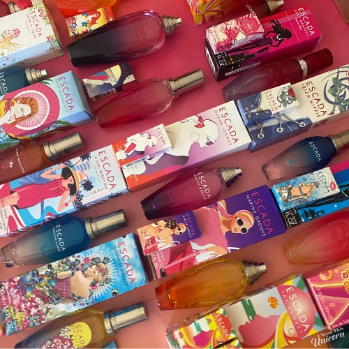 Escada bottles next to their boxes