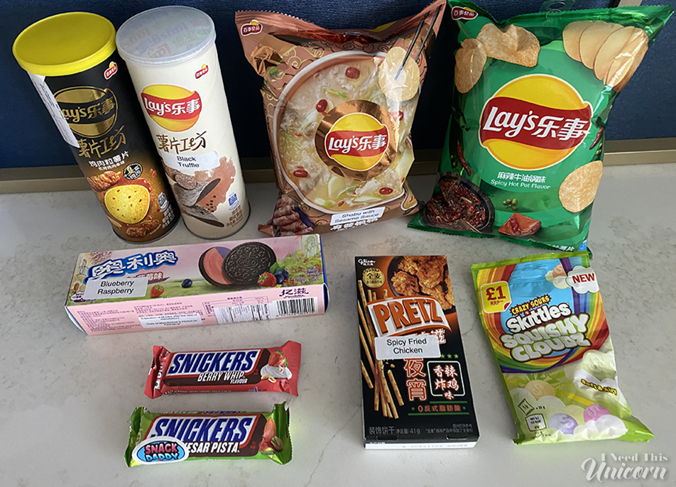 Snack Daddy haul with Asian chips, cookies, Snickers and Skittles