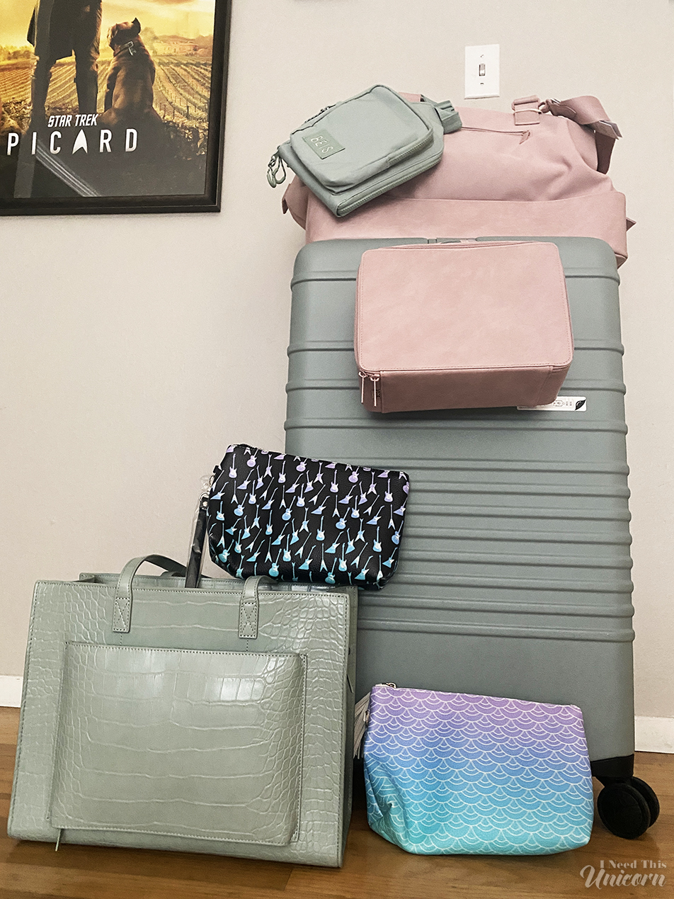 Beis Luggage and Bag Review in Slate and Atlas Pink, pictured with my own I Need This Unicorn brand makeup bags