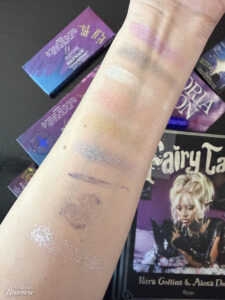 Half Magic Euphoria Eyeshadow Palette, Glitter Puck and Glitter Pill swatched on arm