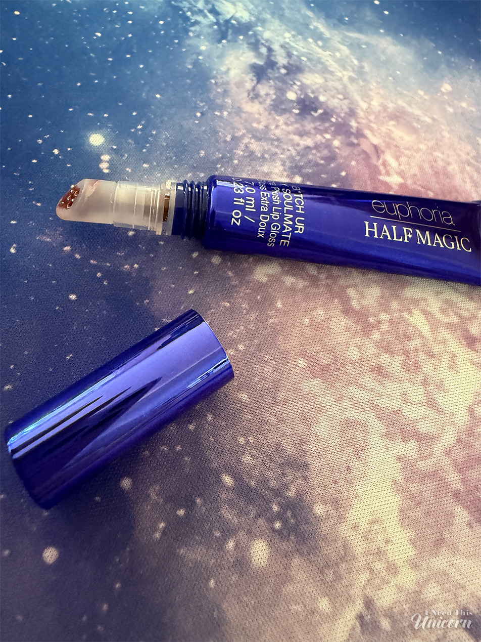 Half Magic Euphoria B*tch You’re My Soulmate Extra Plush Lip Gloss against a galaxy background