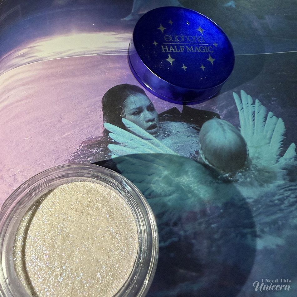 Half Magic Euphoria Glitter Puck in Feel Something shown on still of Rue and Jules in the pool on Halloween