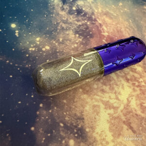 Half Magic Euphoria Magic Glitter Pill pictured on a galaxy background