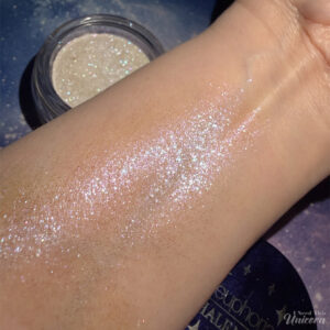 Half Magic Euphoria Glitter Puck in Feel Something swatch on arm