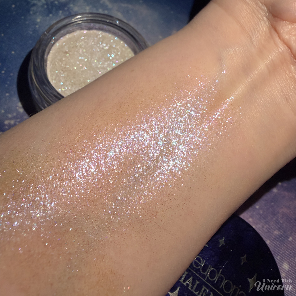 Half Magic Euphoria Glitter Puck in Feel Something swatch on arm