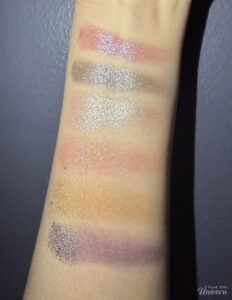Half Magic Euphoria Eyeshadow Palette swatched on arm