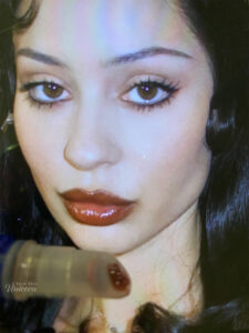 Half Magic Euphoria B*tch You’re My Soulmate Extra Plush Lip Gloss pictured with still of Maddy Perez