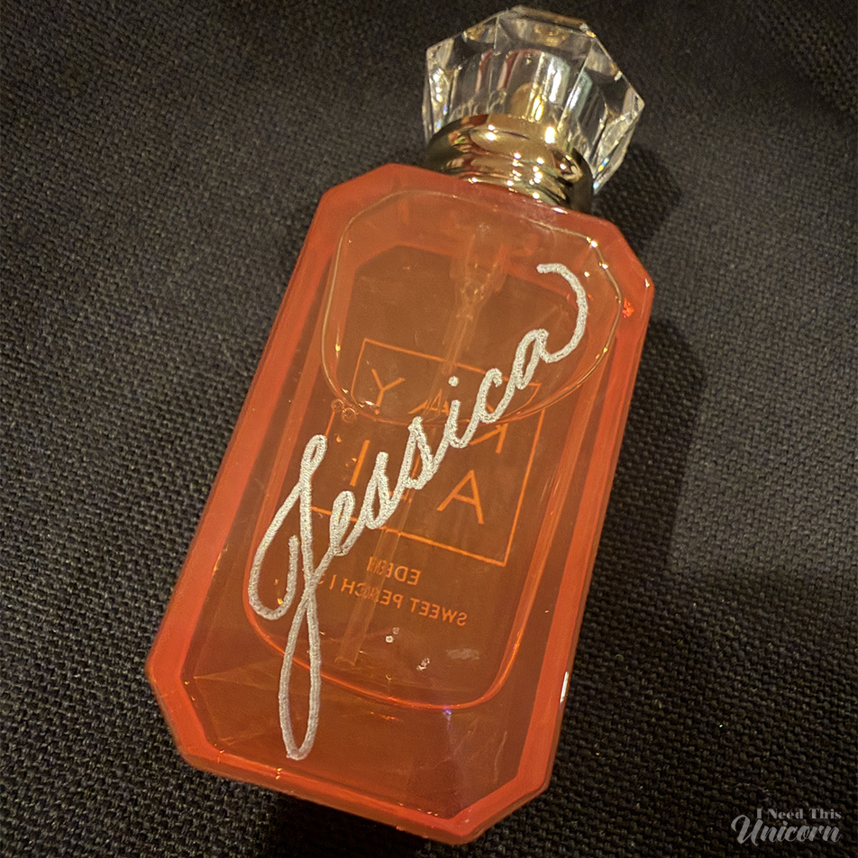 Kayali perfume engraved with the name "Jessica" in silver.