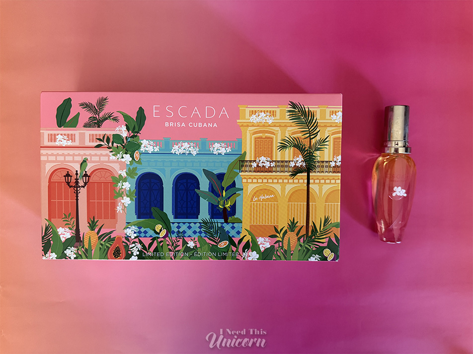 Box and bottle of Brisa Cubana by Escada on an orange to pink background
