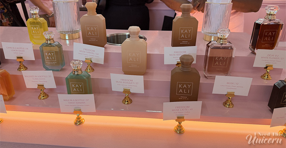 Kayali perfumes all lined up in a row