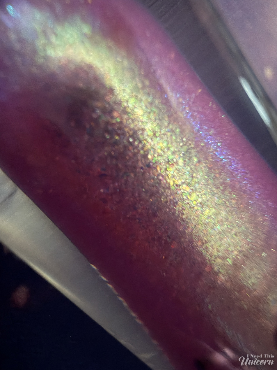 Queen Cosmetics Tester Diamond Shimmer Glosses | I Need This Unicorn Super closeup macro shot of the detail of the shimmers inside Tester #1 lipgloss