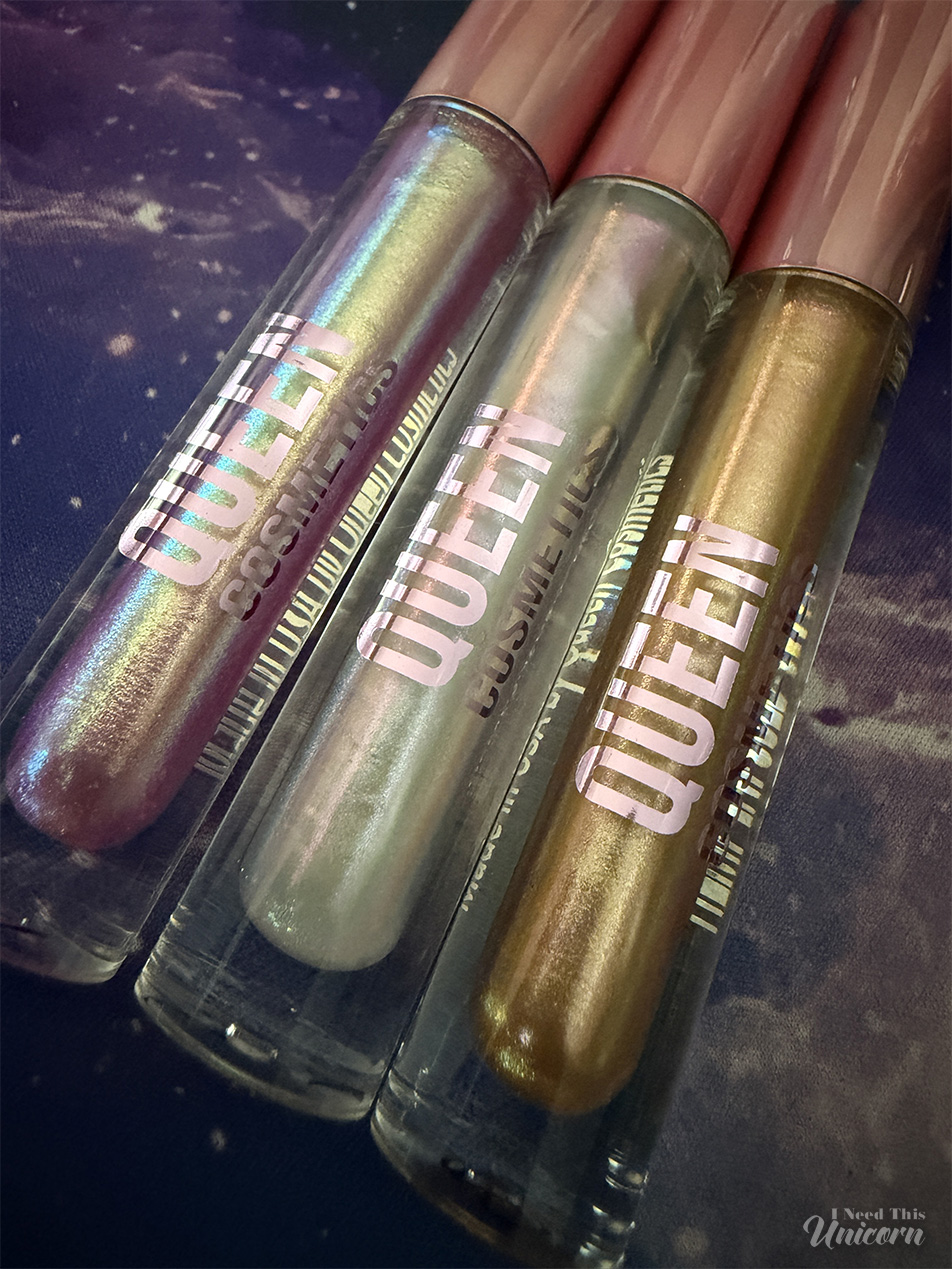 Queen Cosmetics Tester Diamond Shimmer Glosses | I Need This Unicorn Queen Cosmetics limited-edition Tester glosses displayed together, featuring three Diamond Shimmer shades with multi-dimensional sparkle and color-shifting finishes.