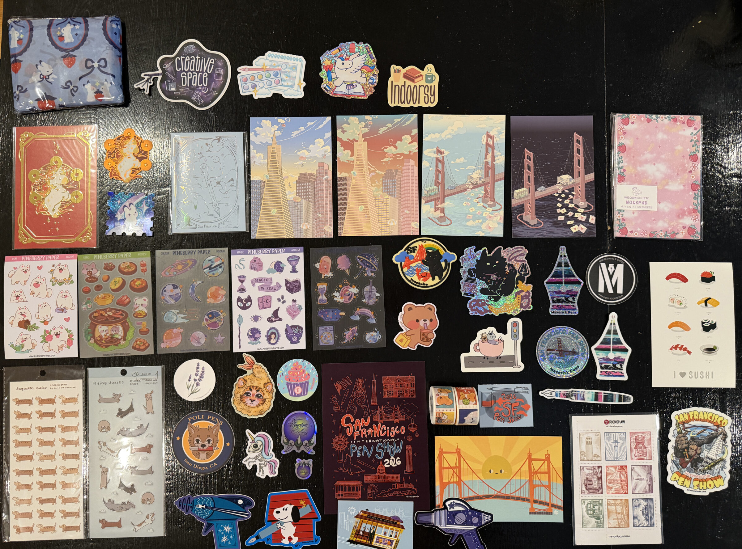 My SF Pen Show haul full of stickers and some postcard prints