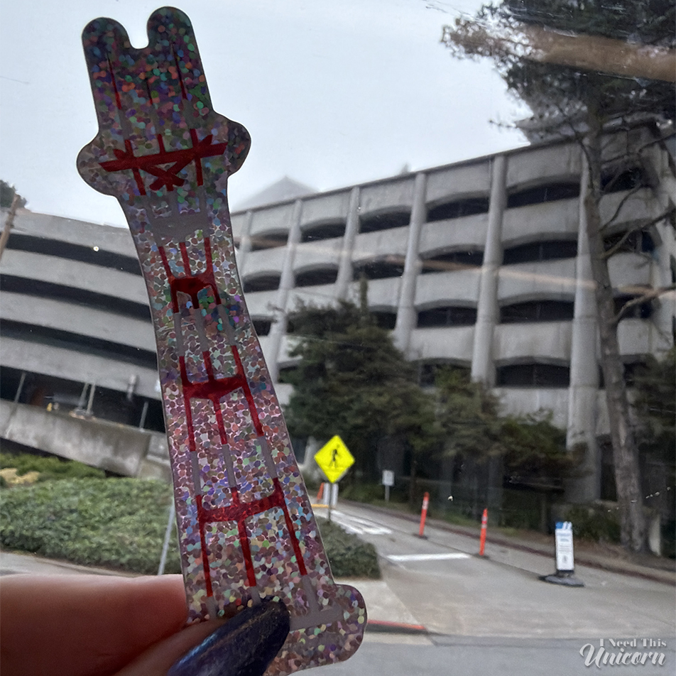 Sutro Tower sticker in front of the UCSF parking lot.